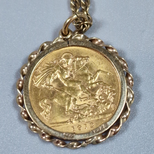 268 - George V gold half sovereign dated 1912, in 9ct gold ornate pendant mount on a 9ct gold rope twist c... 