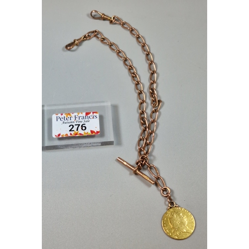 276 - George III gold spade Guinea dated 1791, on a 9ct rose gold curb-link T Bar Albert chain. 39.3g appr... 