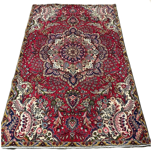 319 - Multi-coloured ground Persian Tabriz unique medallion design rug. 255x160cm approx. (B.P. 21% + VAT)