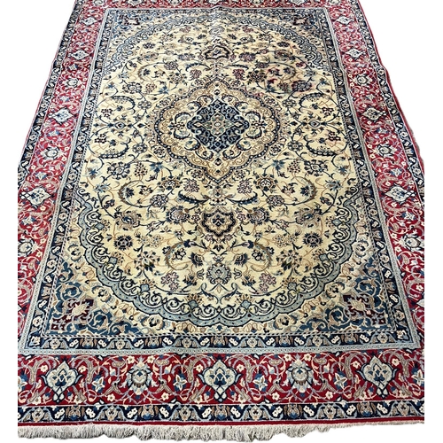 322 - Fine hand woven Persian Nian carpet with large central medallion design and flower and floral repeat... 