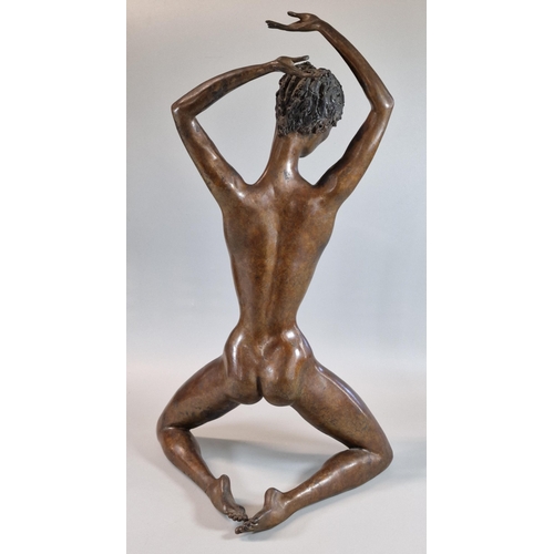 46 - Patinated bronze full length female nude study of a kneeling young woman with outstretched arms. Ind... 