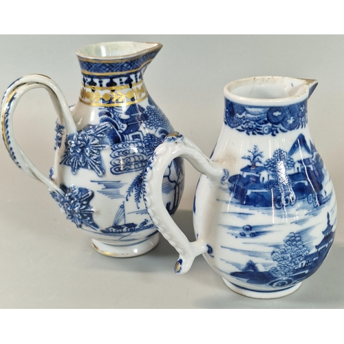 55 - Two 19th century Chinese Export porcelain blue and white Sparrow beak baluster shaped cream jugs, wi... 