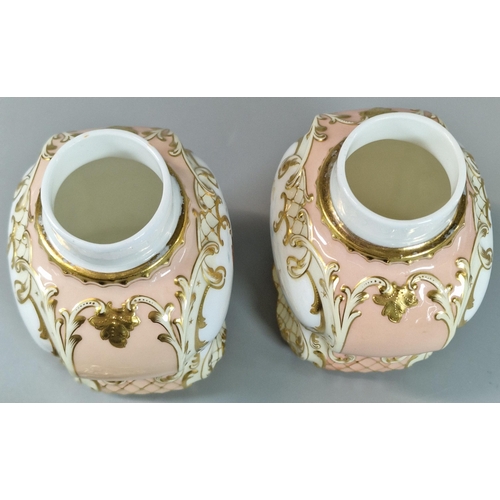 92 - Pair of Mintons porcelain tea caddies, signed by A Boullemier, of baluster form having scrolled cove... 