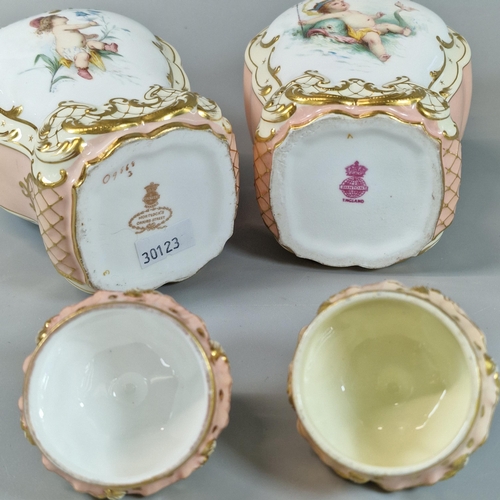 92 - Pair of Mintons porcelain tea caddies, signed by A Boullemier, of baluster form having scrolled cove... 