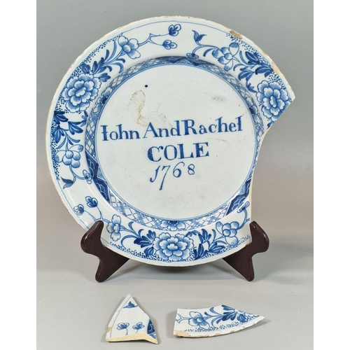 96 - 18th century English Delft blue and white named and dated plate, possibly Liverpool, decorated in Or... 