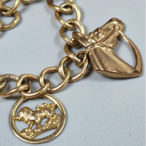 244 - 9ct gold curb link charm bracelet, the charms to include: horse head, heart shaped padlock, boot, st... 