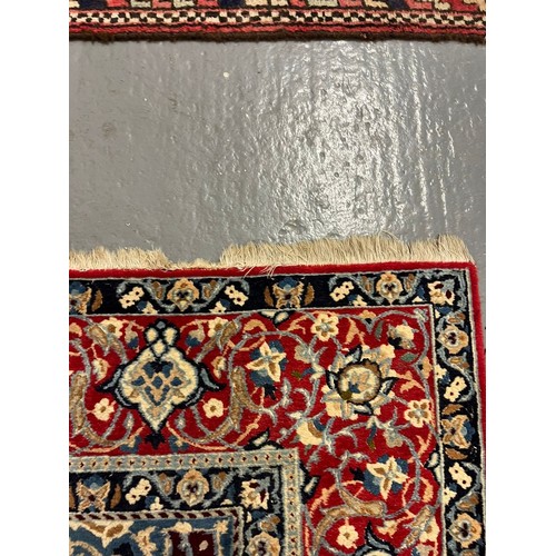 322 - Fine hand woven Persian Nian carpet with large central medallion design and flower and floral repeat... 