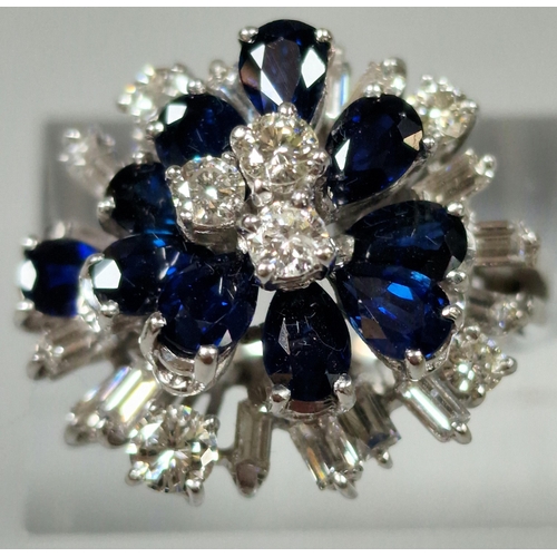 209 - White metal, probably 18ct gold, diamond and sapphire multi-cluster cocktail ring. 8g approx. Size M... 