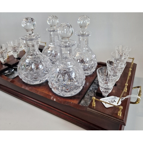 104 - Reproduction mahogany and brass two handled decanter tray, featuring a collection of four baluster s... 