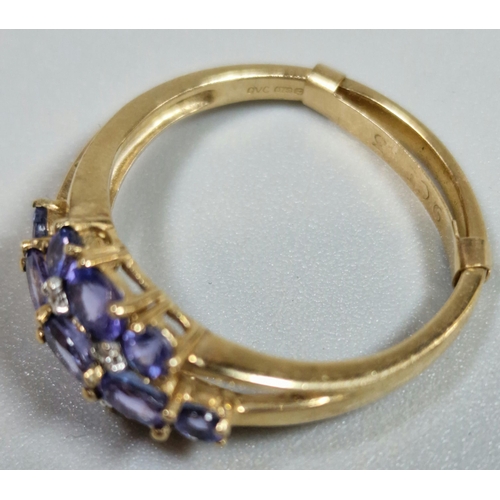 321 - 9ct gold purple stone cluster ring. 2.6g approx. Size P.  (B.P. 21% + VAT)