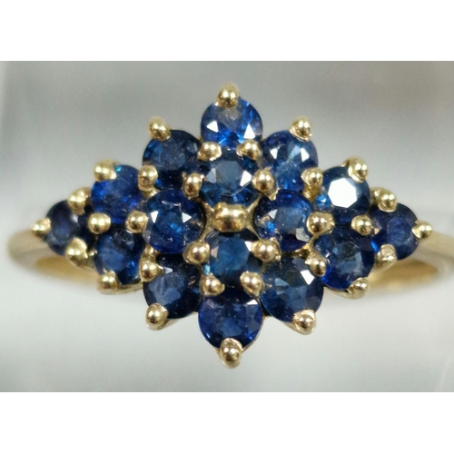 322 - 9ct gold blue stone cluster ring. 1.7g approx. Size Q. (B.P. 21% + VAT)