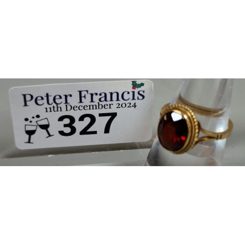 327 - 9ct gold red stone dress ring. 2.7g approx. Size J.  (B.P. 21% + VAT)