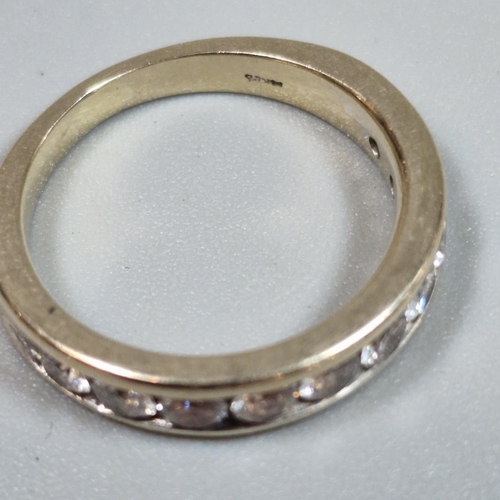 329 - 18ct white gold ten stone round brilliant cut diamond half eternity ring. 3.9g approx. Size K1/2.  (... 