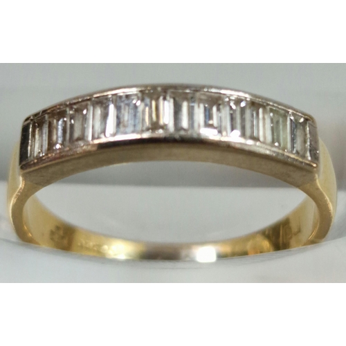 330 - 18ct gold half eternity ring, channel set with twelve baguette diamonds. 3.3g approx. Size M.  (B.P.... 