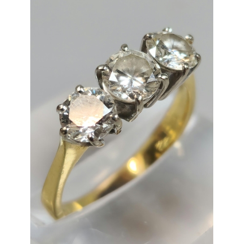 335 - 18ct gold round brilliant cut three stone diamond ring, in claw setting, stamped 750 initials VG. 3....