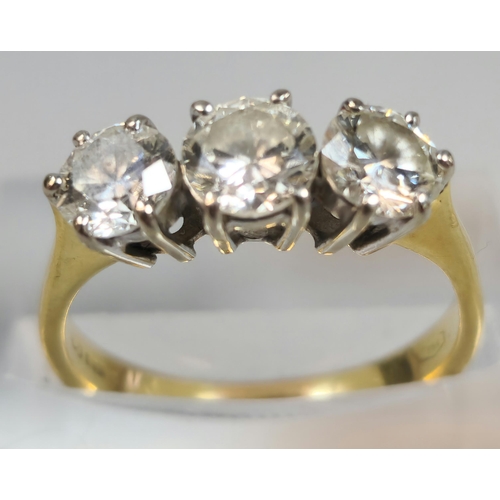 335 - 18ct gold round brilliant cut three stone diamond ring, in claw setting, stamped 750 initials VG. 3.... 