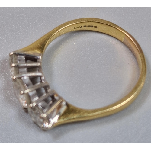 335 - 18ct gold round brilliant cut three stone diamond ring, in claw setting, stamped 750 initials VG. 3.... 