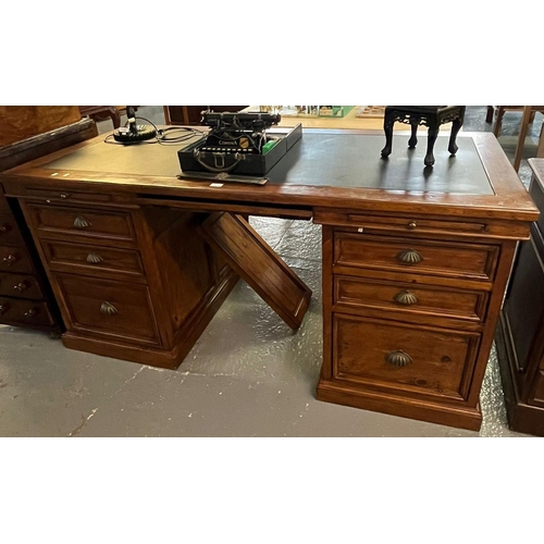 623 - Edwardian style kneehole office desk, with inset surface, three slides over three graduated moulded ... 