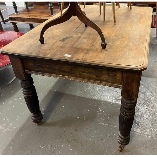 631 - Edwardian scrubbed topped kitchen table, with fluted baluster legs. 120x90x78cm approx. (B.P. 21% + ... 