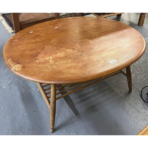 636 - Ercol elm and beech oval coffee table. 98x82x45cm approx. (B.P. 21% + VAT)