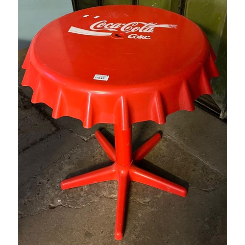 645 - Coca Cola red plastic circular pedestal table. 62cm diameter approx. (B.P. 21% + VAT)