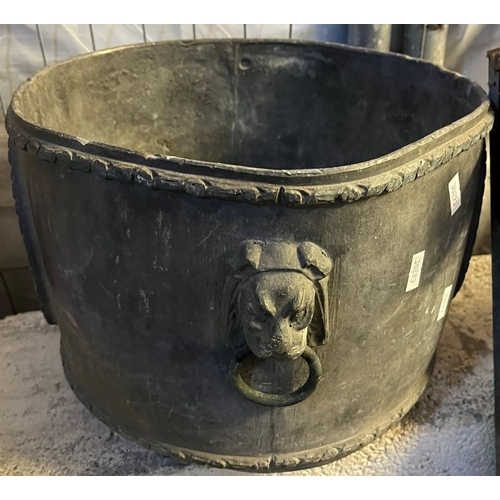 648 - Straight sided lead garden planter, with lion mask mounts and paw feet. 30cm diameter approx. (B.P. ... 