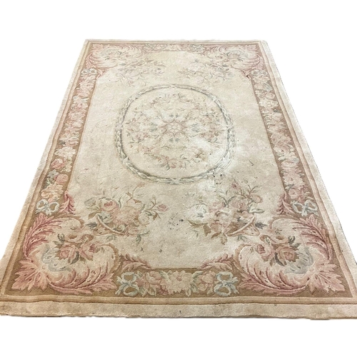 657 - Modern cream ground floral and foliate carpet. 245x155cm approx. (B.P. 21% + VAT)