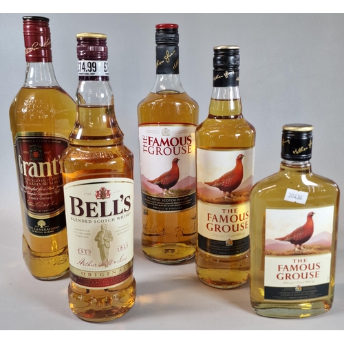 72 - Collection of Whisky to include: The Famous Grouse 1 Litre 70cl and 35cl. Together with a bottle of ... 