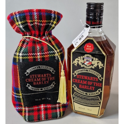 Bottle of Stewarts Cream of the Barley Special Reserve Scotch Whisky, in tartan bag. 75cl.  (B.P. 21% + VAT)