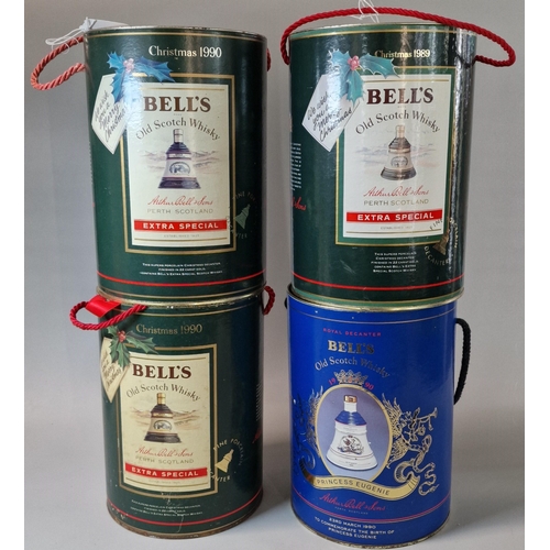 97 - Three Bell's Christmas Old Scotch Whisky decanters dated: 1989 and 1990x2. Together with another Bel... 