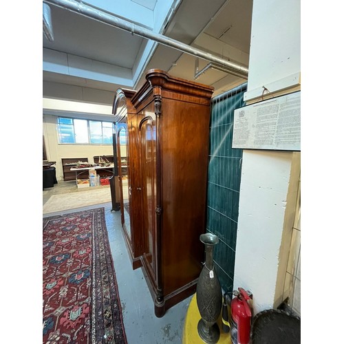 654 - Victorian mahogany break front wardrobe, having arched pediment over centre glazed door revealing fi... 