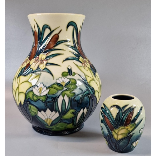 1 - Moorcroft Pottery tube lined vase, of baluster form in the 'Bullrush and Lilies' pattern. 24cm high ... 