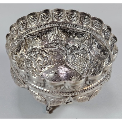 197 - Indian white metal footed bowl, repoussé decorated with Indian figures, flowers and foliage. 10cm di... 