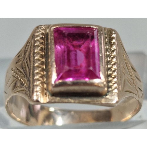 211 - Yellow metal signet ring inset with pink stone. Not Tested. 3.2g approx. Size M. (B.P. 21% + VAT)