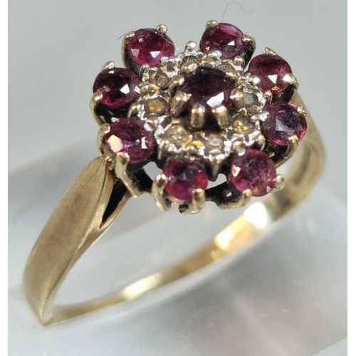 212 - 9ct gold garnet cluster ring. 2.7g approx. Size P1/2. (B.P. 21% + VAT)