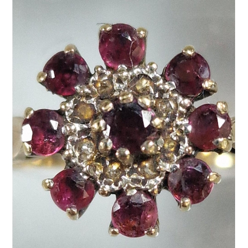 212 - 9ct gold garnet cluster ring. 2.7g approx. Size P1/2. (B.P. 21% + VAT)