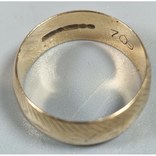 213 - 9ct gold engraved wedding band. 4g approx. Size N. (B.P. 21% + VAT)