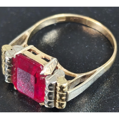 215 - 9ct gold red stone dress ring. 5.7g approx. Size S1/2. (B.P. 21% + VAT)