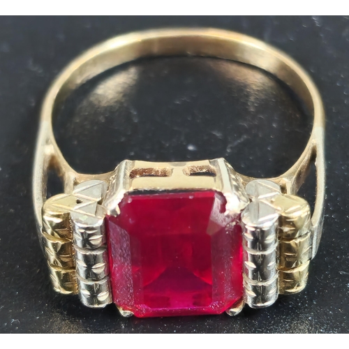 215 - 9ct gold red stone dress ring. 5.7g approx. Size S1/2. (B.P. 21% + VAT)