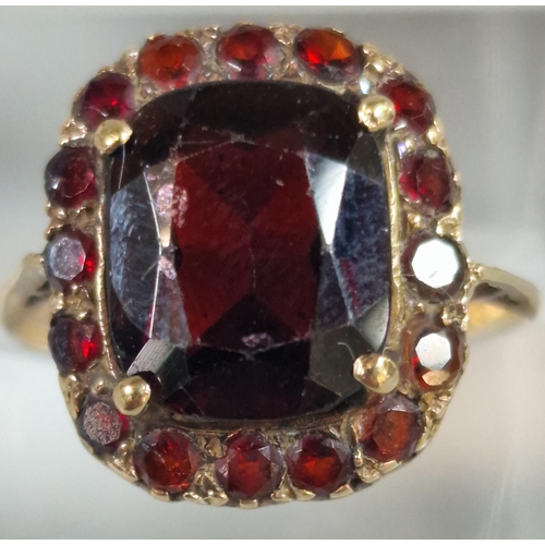 218 - 9ct gold and  garnet ring. 2.6g approx. Size K. (B.P. 21% + VAT)