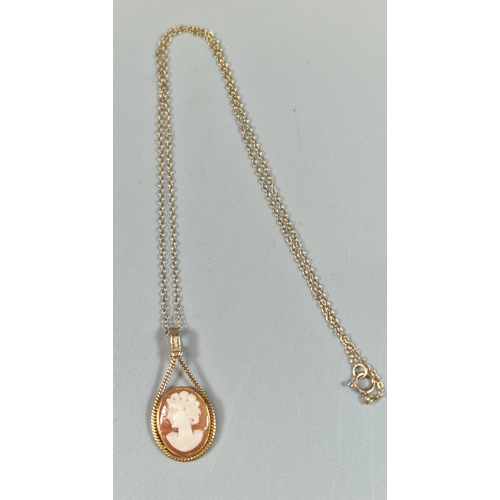 221 - 9ct gold fine link chain with 9ct gold cameo portrait pendant. 2.8g approx. (B.P. 21% + VAT)