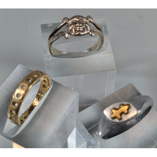 224 - 9ct gold eternity style ring. 1.9g approx. Together with a silver dress ring with buddha head and wh... 