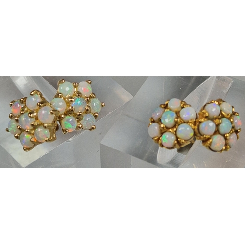 226 - Two similar pairs of opal cluster earrings, one marked 9ct gold the other RG. (B.P. 21% + VAT)