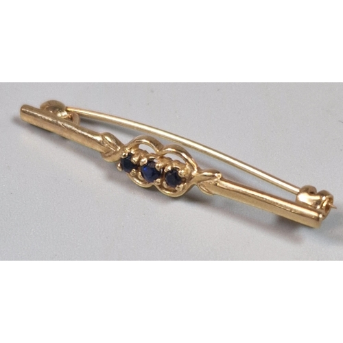 227 - 9ct gold sapphire three stone bar brooch. 1.8g approx. (B.P. 21% + VAT)