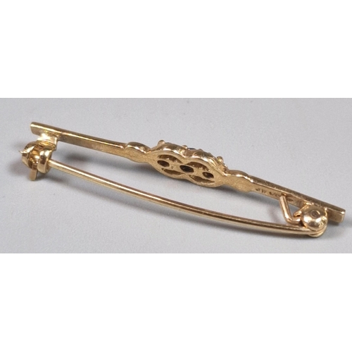 227 - 9ct gold sapphire three stone bar brooch. 1.8g approx. (B.P. 21% + VAT)