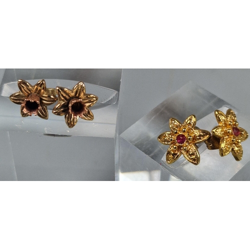 229 - Pair of 9ct gold Daffodil earrings. 1.5g approx. Together with another pair of gold plated flowerhea... 