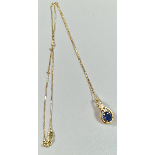 240 - 9ct gold fine link chain with blue stone and diamond pear shaped pendant. 3.7g approx. (B.P. 21% + V... 