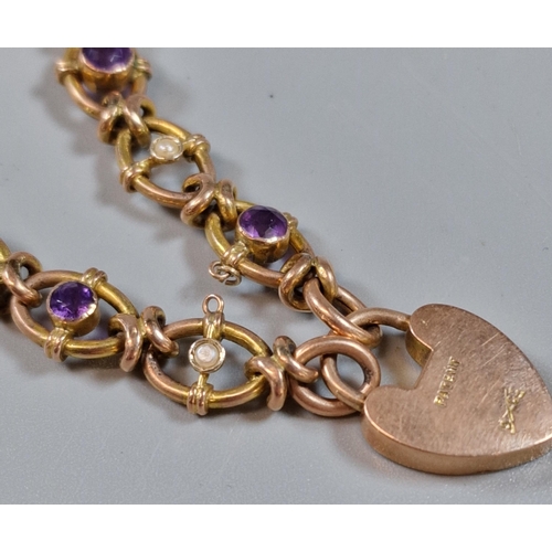 253 - Ornate 9ct gold amethyst and pearl curb-link bracelet with heart shaped padlock, in leather box mark... 