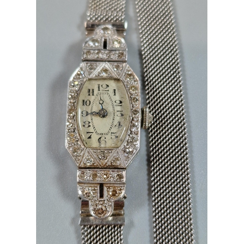 255 - 9ct white gold and diamond Art Deco ladies' wristwatch, with 9ct white gold mesh strap. 19g approx. ... 