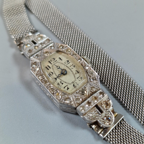 255 - 9ct white gold and diamond Art Deco ladies' wristwatch, with 9ct white gold mesh strap. 19g approx. ... 